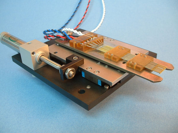 Automated probe connector for testing LEDs